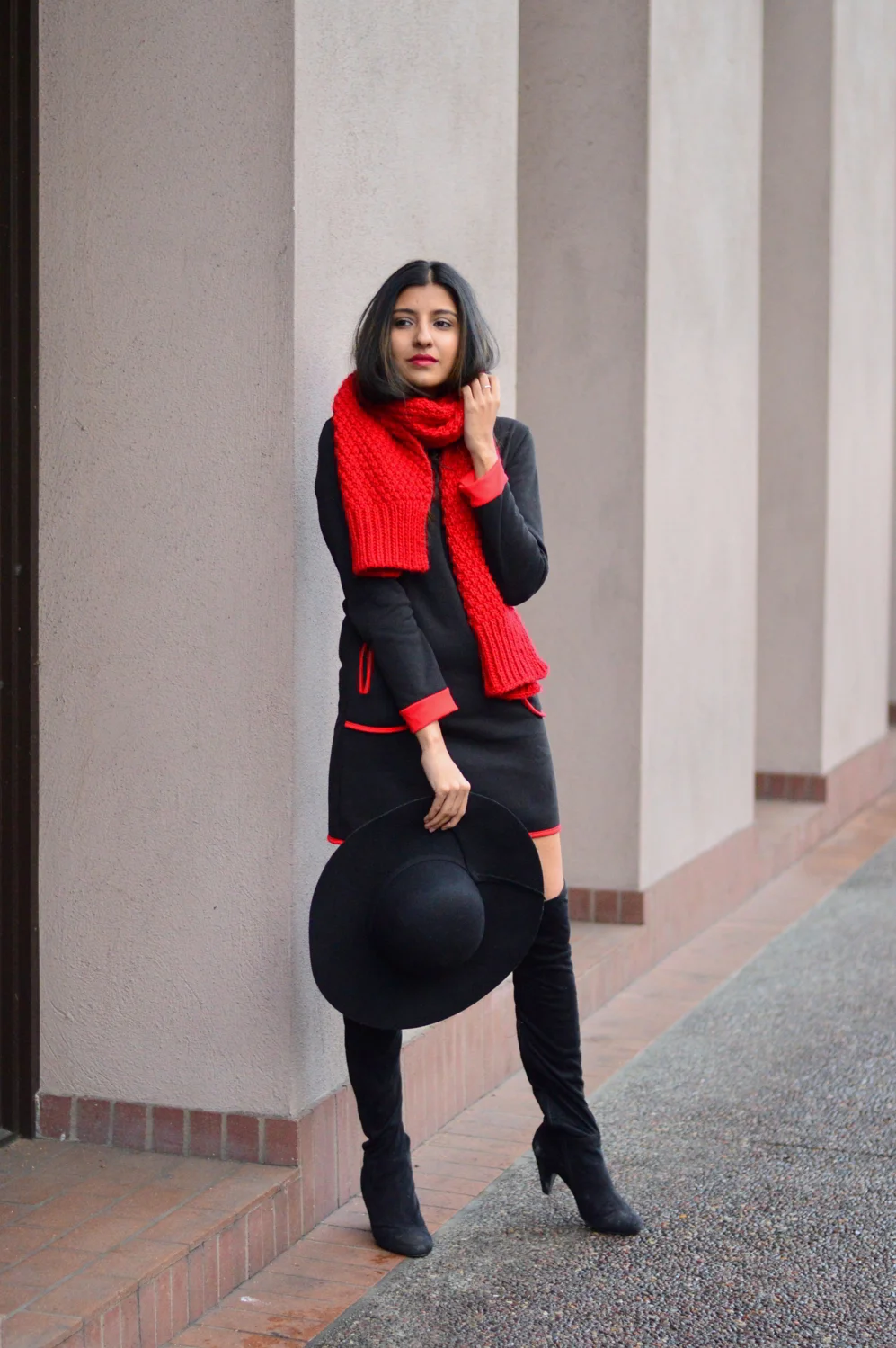 Red sweater dress shop with boots